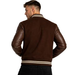 Man wearing a brown leather jacket with white stripes on a white background
