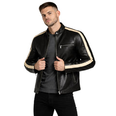 Man wearing a black leather jacket with beige accents on a white background