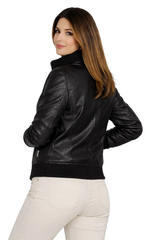 Woman wearing a black leather jacket on a white background