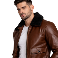 Man wearing a brown leather jacket with black fur lining on a white background