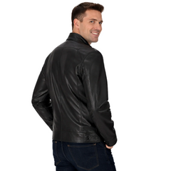 Man wearing a black leather jacket on a white background