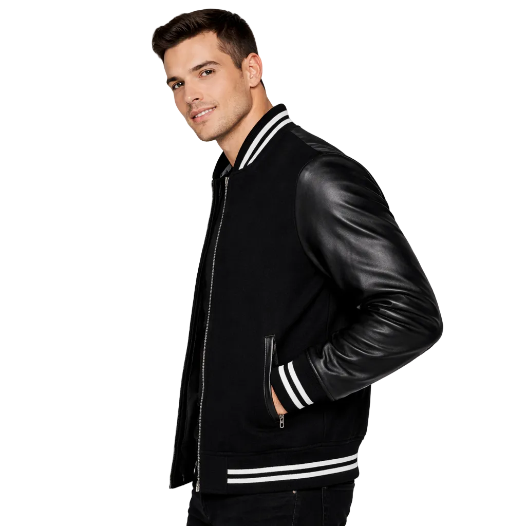 Man wearing a black varsity jacket with leather sleeves on a white background
